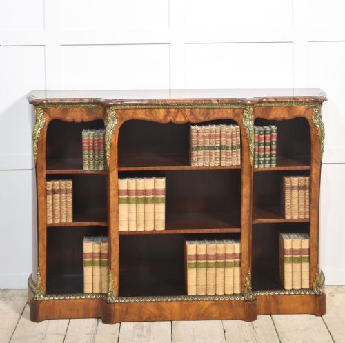 GILT METAL MOUNTED WALNUT BREAKFRONT OPEN BOOKCASE