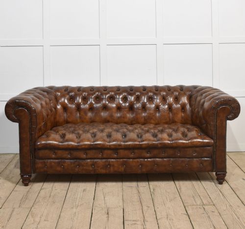 brown leather deep buttoned chesterfield - CATEGORY: ANTIQUE SOFAS - DATED 1910