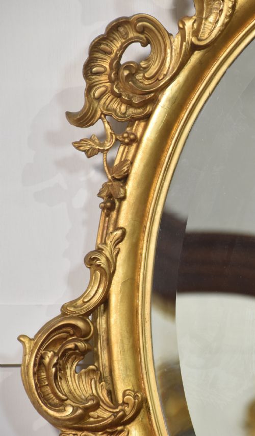 CARVED GILTWOOD OVAL WALL MIRROR - ADDITIONAL PHOTO 4