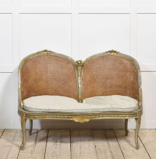 Painted and Parcel Gilt Caned Canape Settee