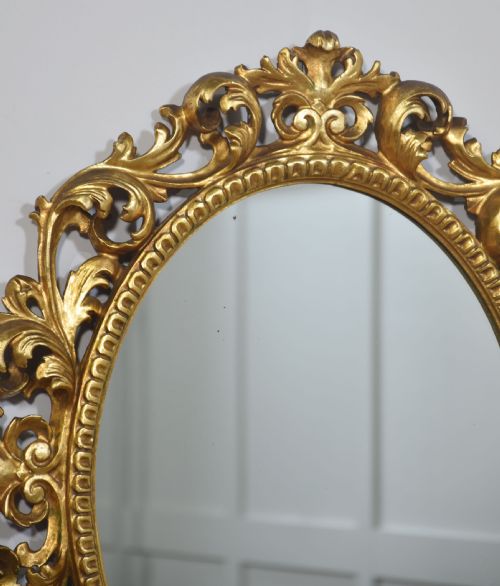 CARVED GILTWOOD OVAL WALL MIRROR - ADDITIONAL PHOTO 4