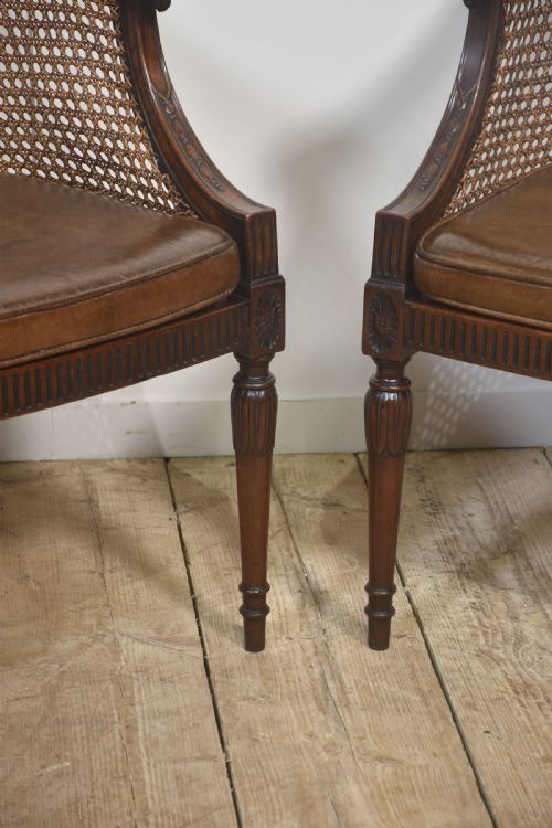 PAIR OF CARVED MAHOGANY AND CANE LIBRARY CHAIRS - ADDITIONAL PHOTO 4