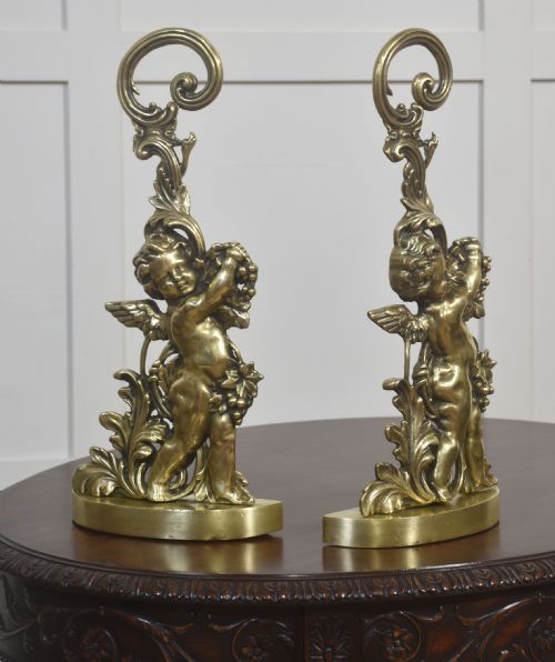 PAIR OF BRASS PUTTI DOOR STOPS - ADDITIONAL PHOTO 3