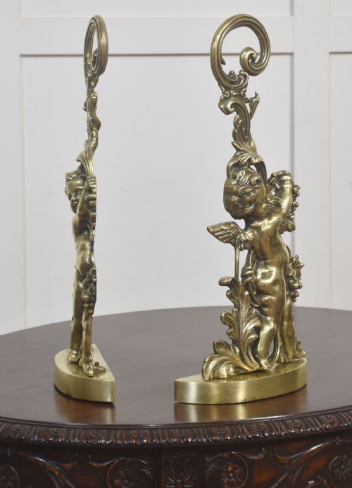 PAIR OF BRASS PUTTI DOOR STOPS - ADDITIONAL PHOTO 4