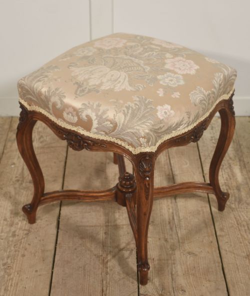 fig 1. Pair of French Louis XV–Style Carved Walnut Stools