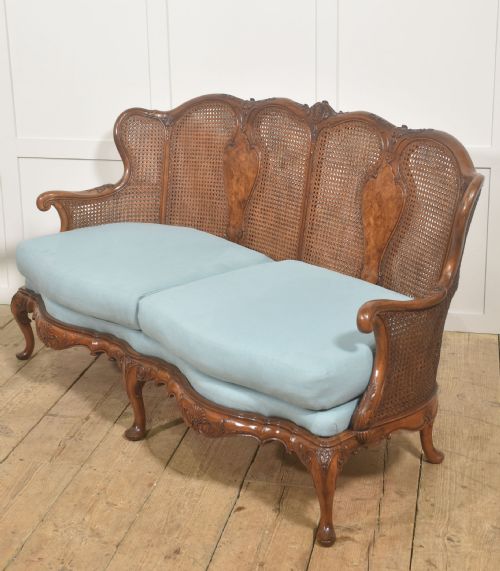 LOUIS XV STYLE CARVED WALNUT AND CANE SETTEE - ADDITIONAL PHOTO 1