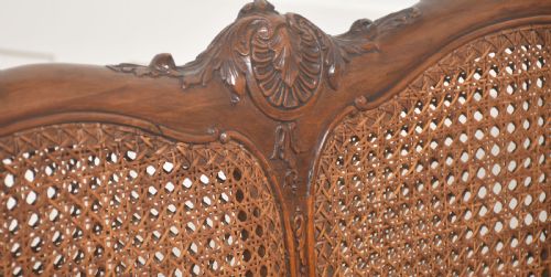 LOUIS XV STYLE CARVED WALNUT AND CANE SETTEE - ADDITIONAL PHOTO 7