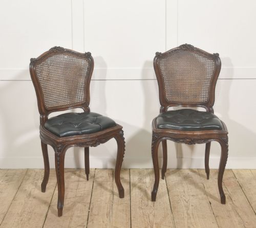 PAIR OF LOUIS XV STYLE CARVED WALNUT AND CANED SIDE CHAIRS - ADDITIONAL PHOTO 4
