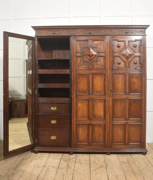 JACOBEAN REVIVAL CARVED OAK TRIPLEDOOR WARDROBE - ADDITIONAL PHOTO 4
