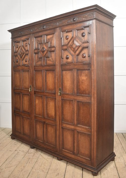 JACOBEAN REVIVAL CARVED OAK TRIPLEDOOR WARDROBE - ADDITIONAL PHOTO 5