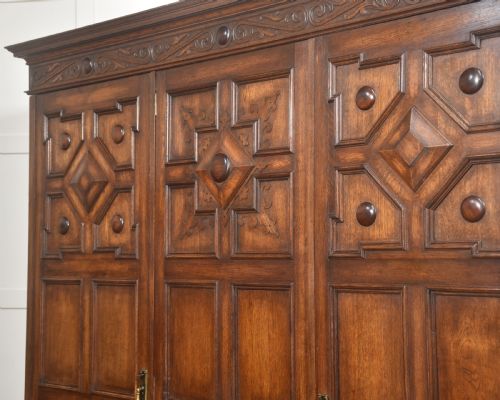 JACOBEAN REVIVAL CARVED OAK TRIPLEDOOR WARDROBE - ADDITIONAL PHOTO 8