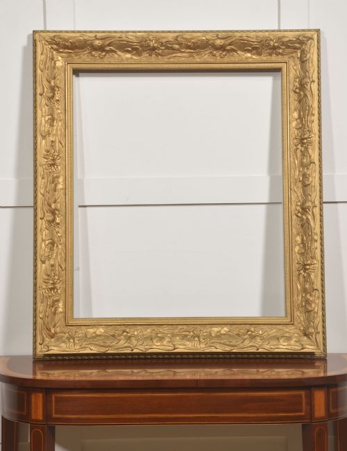 LARGE ART NOUVEAU STYLE GILTWOOD PICTURE FRAME