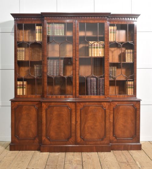 REGENCY REVIVAL FLAME MAHOGANY BREAKFRONT LIBRARY BOOKCASE