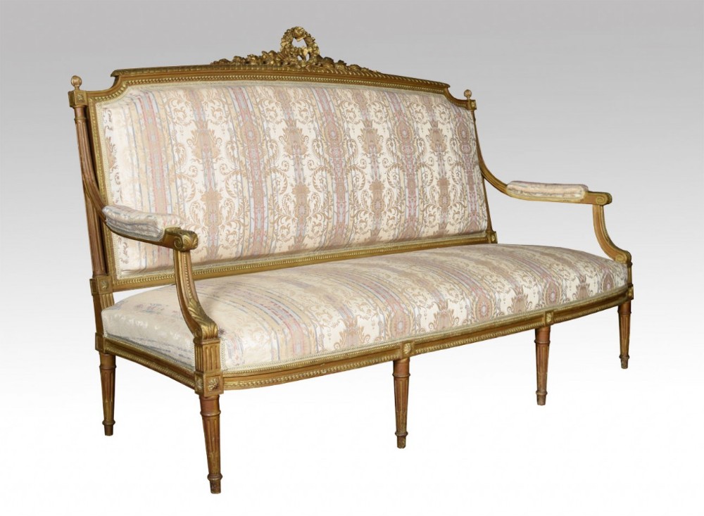 French Louis XVI style giltwood three seater settee