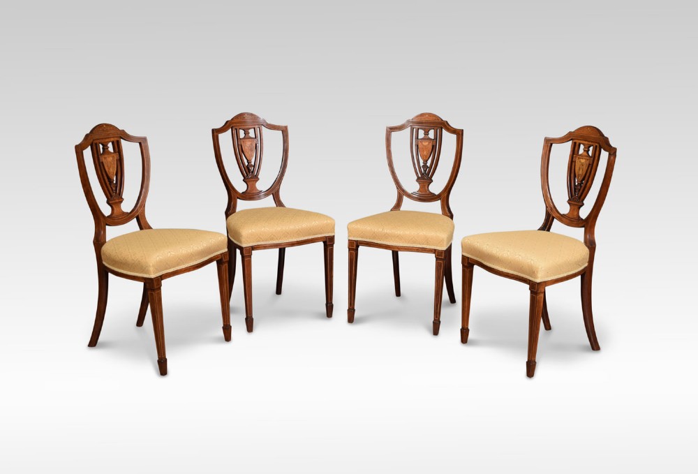 Set of four Edwardian rosewood inlaid side chairs