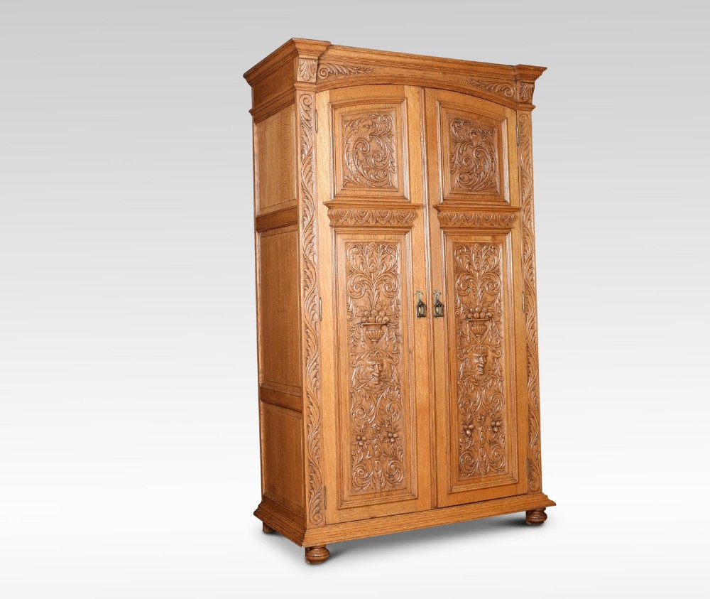 19th Century carved oak wardrobe