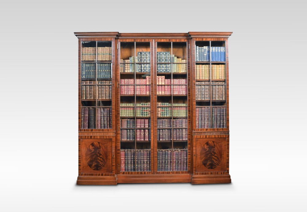 Figured mahogany four door bookcase
