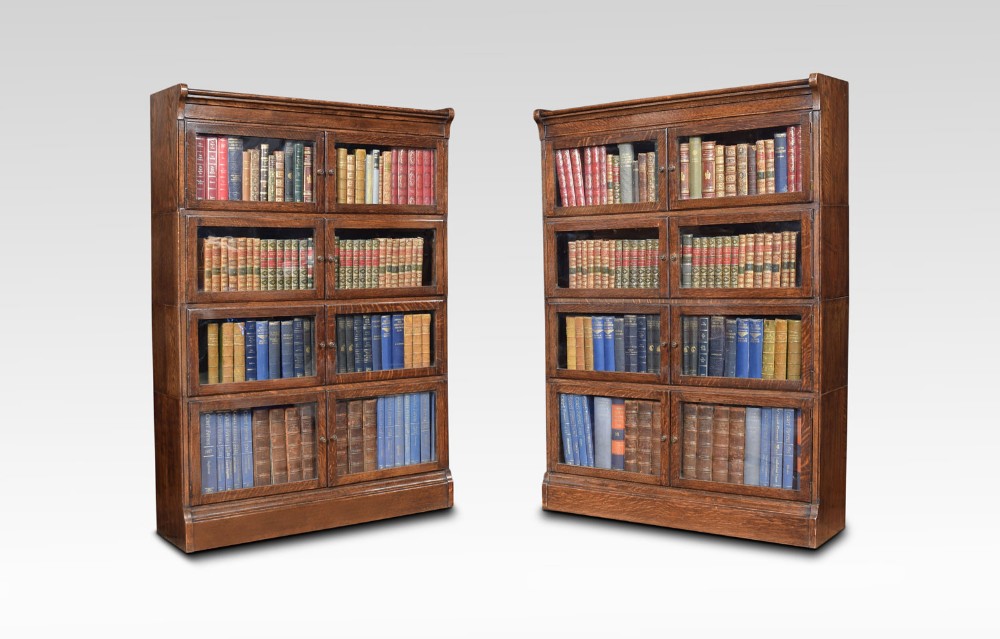 Pair of oak four sectional bookcase