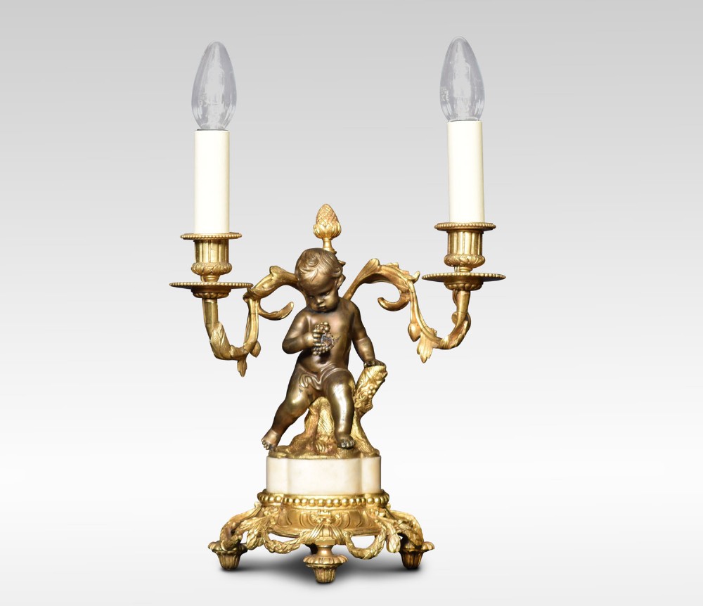 Twin branched ormolu and bronzed table lamp