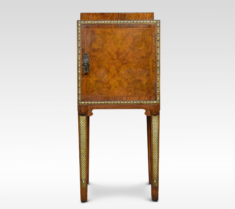 Figured walnut and parcel gilt bedside cabinet