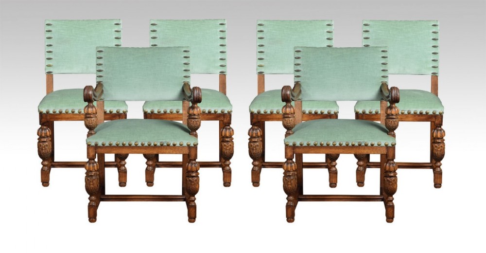 Set of six carved oak dining chairs