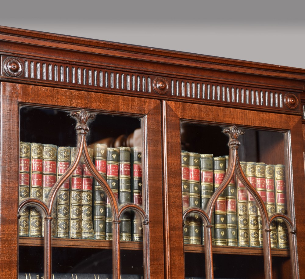 Mahogany four door breakfront bookcase of small proportions View V