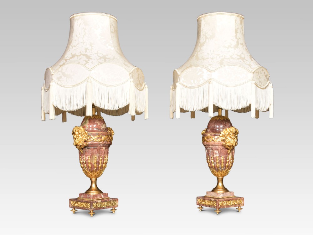 Pair of gilt and marble lamps