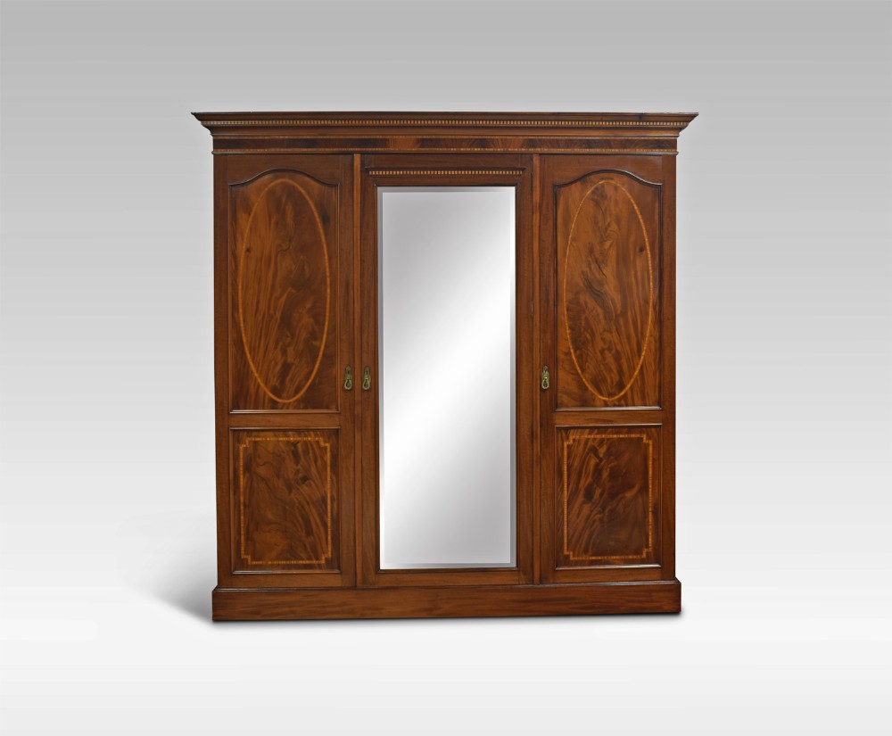 Figured Mahogany three door Wardrobe