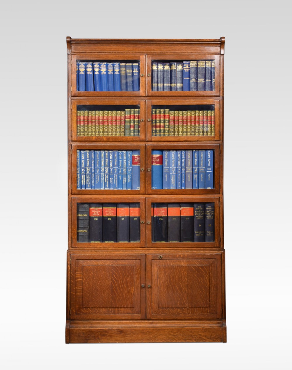 Oak five sectional bookcases by Minty