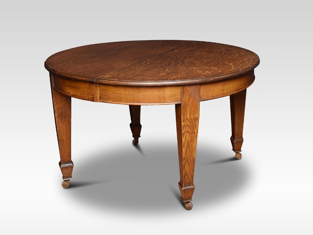 Oak oval extending dining table