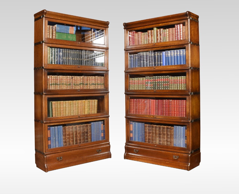 Pair of oak globe Wernicke five section bookcases