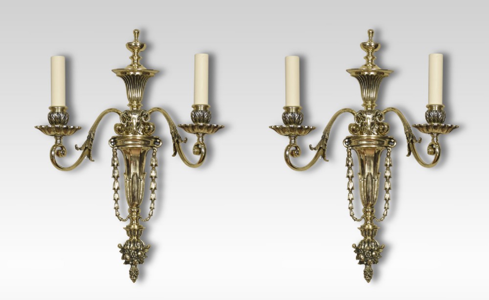  Pair of late 19th century French gilt metal two branch wall lights