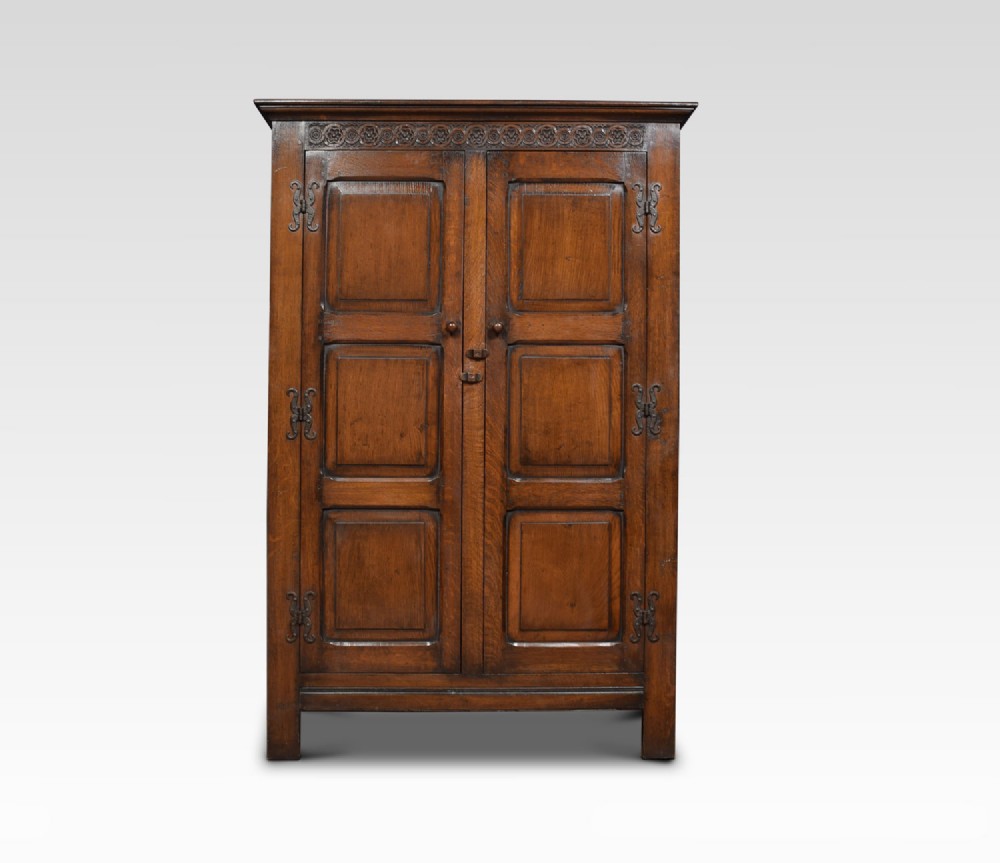 Carved oak wardrobe