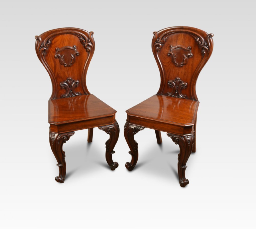 Pair of Victorian mahogany hall chairs