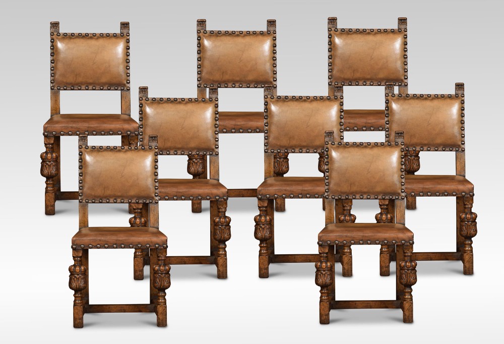 Set of eight carved oak dining chairs