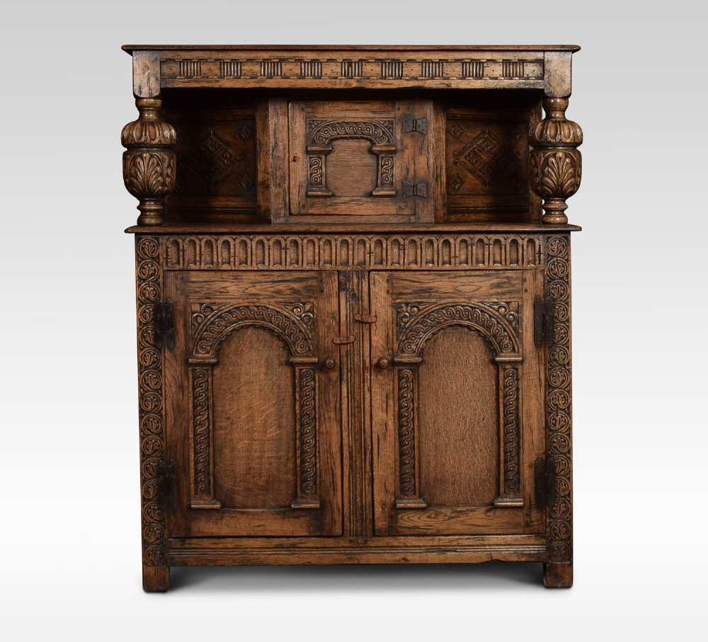 Carved oak court cupboard