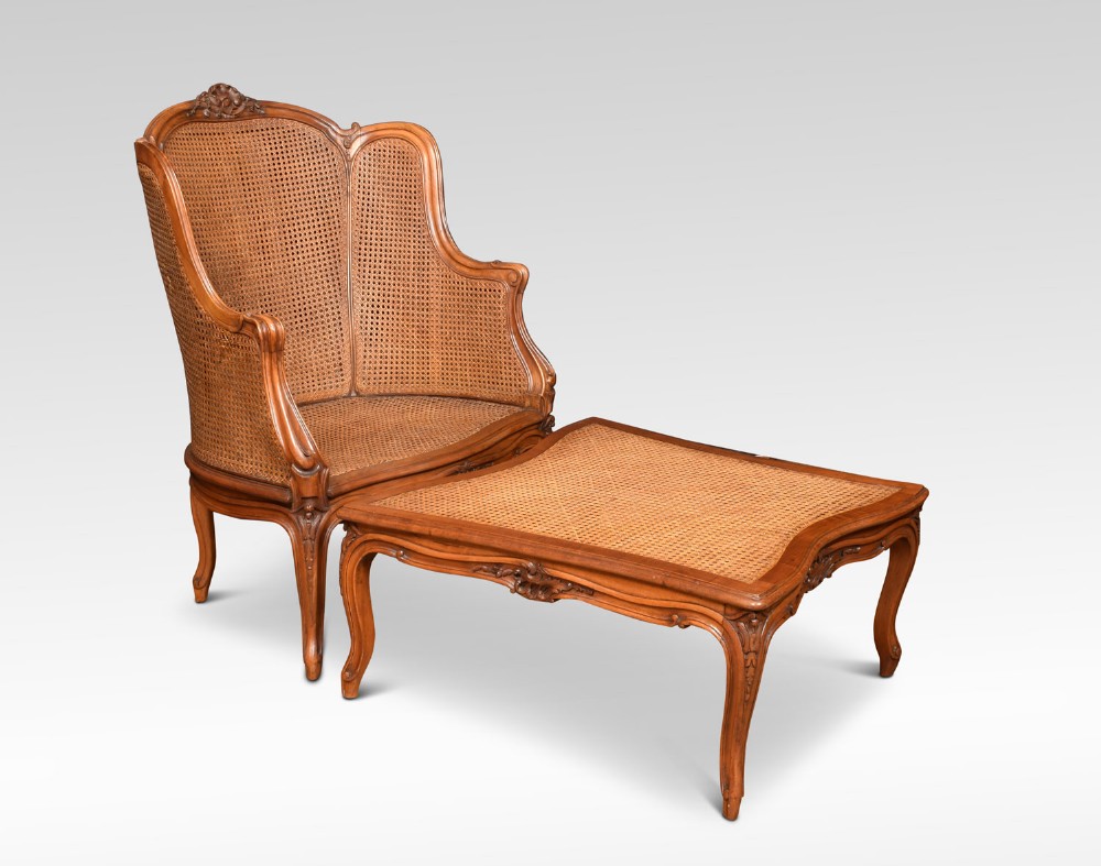 Late 19th Century French walnut Armchair with conforming stool