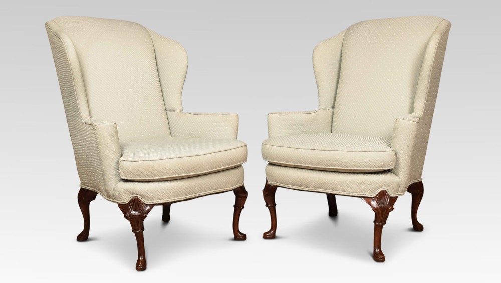 Pair of Georgian style wing armchairs