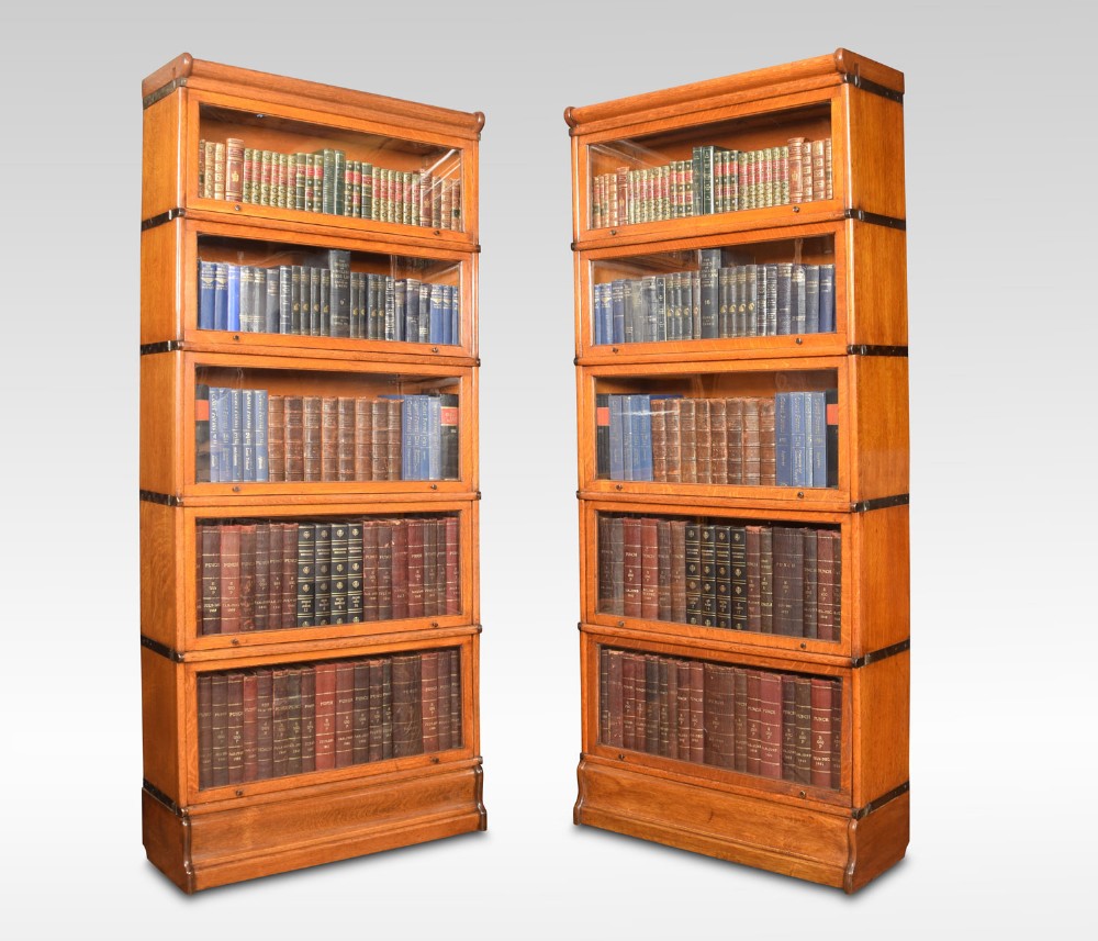 Pair of oak globe Wernicke five section bookcases