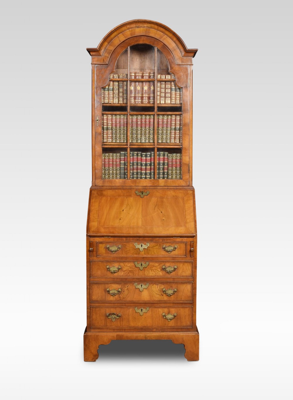 Walnut bureau bookcase of small proportions