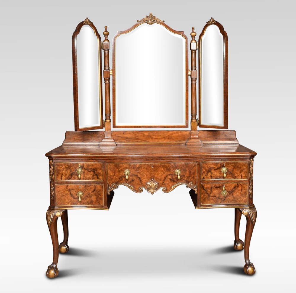 Serpentine walnut dressing table by Maple and Co