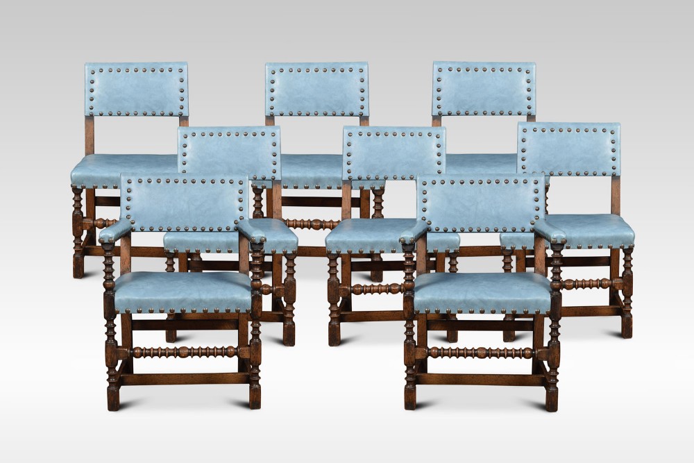 Set of eight substantial oak dining chairs