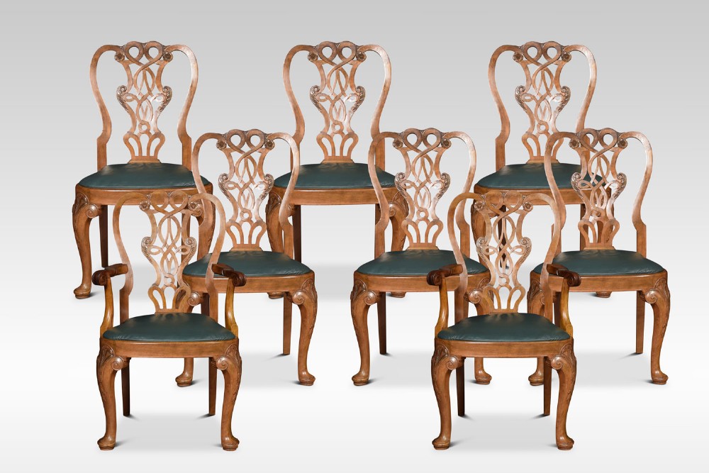 Set of eight walnut dining chairs