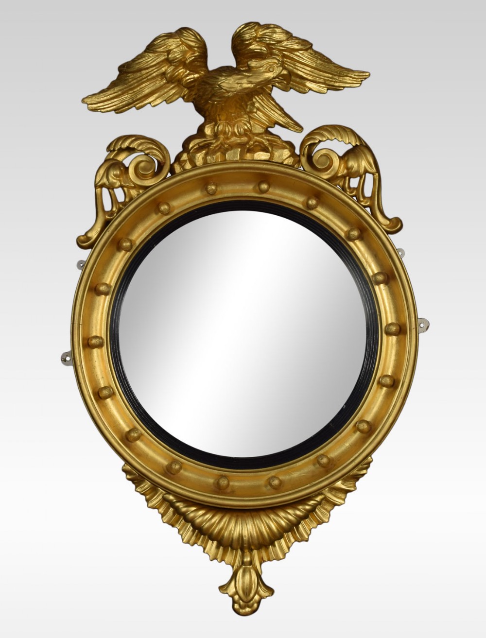 Regency giltwood and gesso circular convex mirror