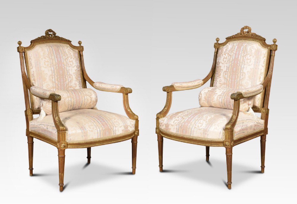Pair of French Louis XVI style giltwood Armchairs