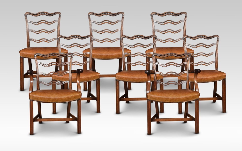 Set of eight mahogany ribbon back Chippendale style dining chairs