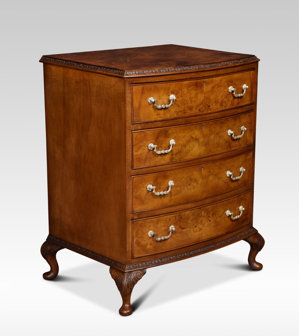 Figured walnut bow fronted chest of draws