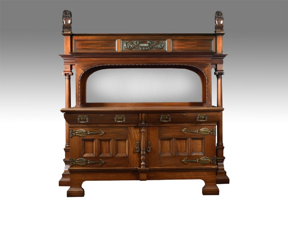 Large carved walnut mirrored back sideboard