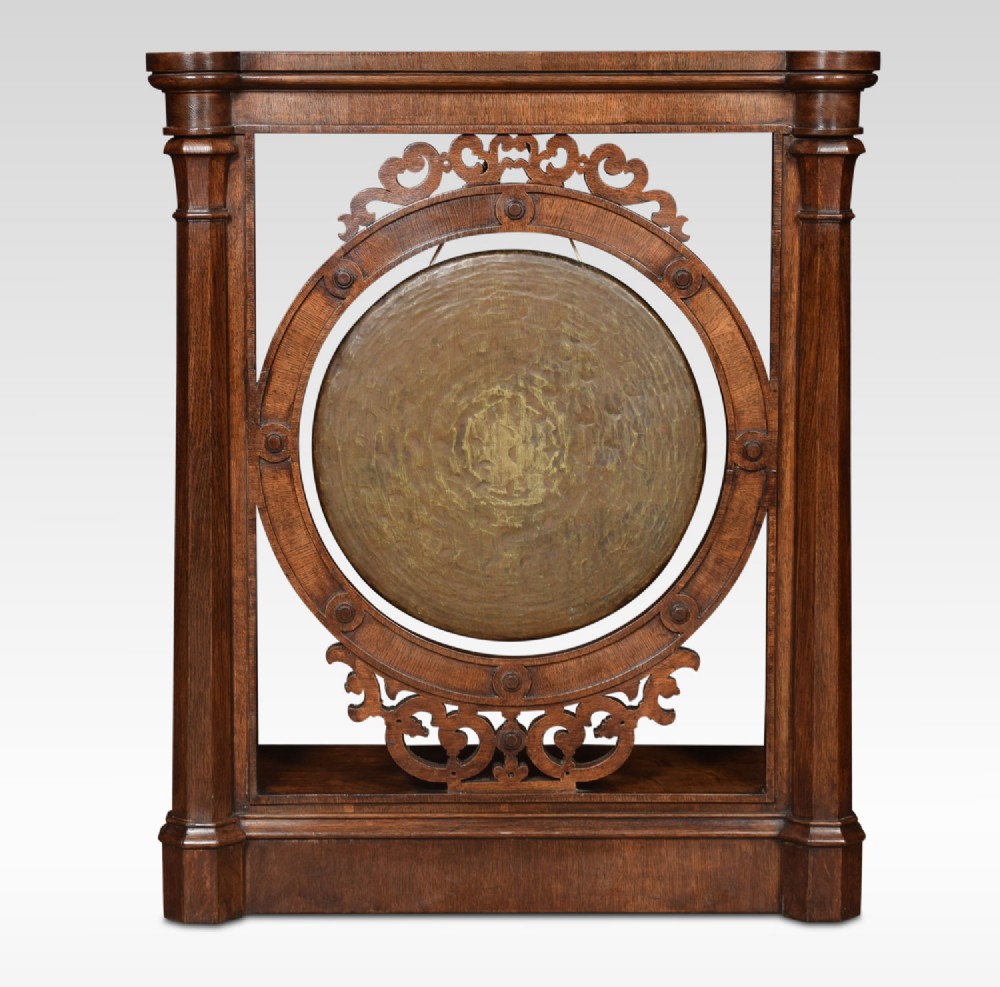 Oak framed dinner gong of gothic design
