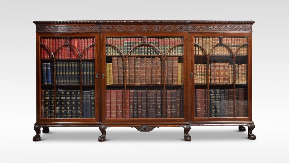 Chippendale revival mahogany breakfront bookcase by Maple and Co